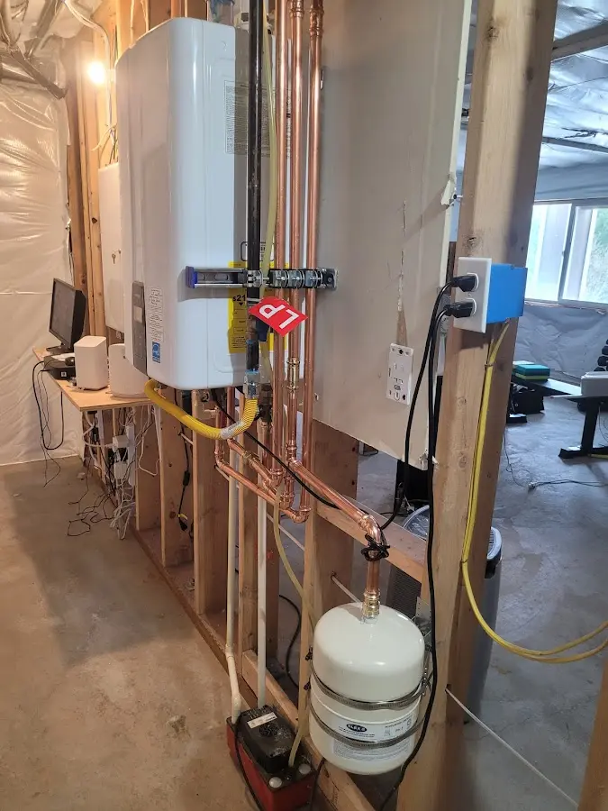 Licensed plumber repairing a kitchen sink in Statesboro